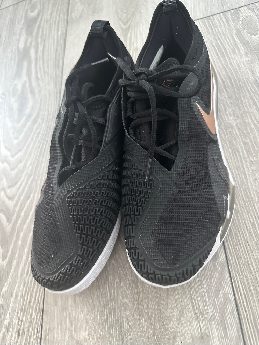 Nike Women’s Black with Rose Gold Swoosh Training Sneakers